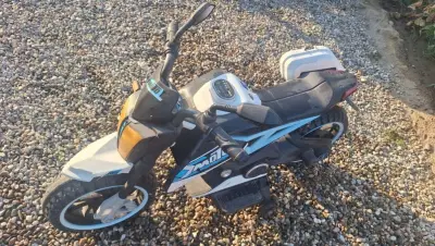 Donez motocicleta copii